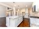 Kitchen with a granite island, stainless steel appliances and view of the living area at 2571 Se Ebenezer Rd, Conyers, GA 30094