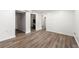 Unfinished basement with wood-look floors at 2290 Wilkins Cv, Decatur, GA 30035