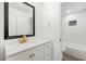 Bathroom featuring a vanity with modern fixtures, a mirror, and a tub with white subway tile at 2290 Wilkins Cv, Decatur, GA 30035
