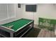 Game room with pool table, TV, and bar stools at 2290 Wilkins Cv, Decatur, GA 30035