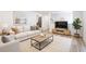 Bright living room featuring a plush sofa, modern furniture, and stylish decor for comfortable living at 2290 Wilkins Cv, Decatur, GA 30035