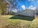 Large backyard with mature trees at 488 Village Run, Lawrenceville, GA 30046