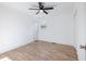 Bright bedroom with ceiling fan and hardwood floors at 488 Village Run, Lawrenceville, GA 30046