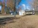 Front view of a charming house with a deck at 488 Village Run, Lawrenceville, GA 30046