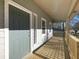 Covered front porch with new paint and wood floors at 488 Village Run, Lawrenceville, GA 30046