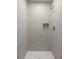 Clean shower with gray tile and a small niche at 488 Village Run, Lawrenceville, GA 30046