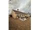 Backyard with patio and seating, perfect for outdoor entertaining and relaxation at 1060 S Creek Dr, Villa Rica, GA 30180