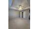 Neutral colored bedroom featuring a closet and a ceiling fan with overhead light at 230 Valley Xing, Canton, GA 30114