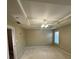 Spacious bedroom with neutral carpeting, modern ceiling fan, and abundant natural light at 230 Valley Xing, Canton, GA 30114