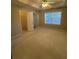Comfortable bedroom featuring a walk-in closet and a large window for natural light at 230 Valley Xing, Canton, GA 30114
