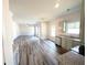 Open kitchen with granite countertops and gray cabinets at 1102 Campbell Rd, Covington, GA 30014