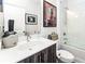 Modern bathroom with white subway tile, bathtub, and updated vanity at 462 Latta Ne St, Atlanta, GA 30308