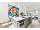 Modern kitchen with island, stainless steel appliances, and white cabinetry at 462 Latta Ne St, Atlanta, GA 30308