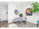 Bright living room with gray sofa and unique artwork at 462 Latta Ne St, Atlanta, GA 30308