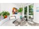 Bright living room featuring a curved sofa and large windows at 462 Latta Ne St, Atlanta, GA 30308