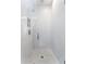 Modern shower with white subway tiles and a glass enclosure at 462 Latta Ne St, Atlanta, GA 30308