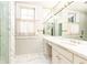 Elegant bathroom with marble flooring and a large vanity at 2933 Andrews Nw Dr, Atlanta, GA 30305