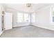 Bright bedroom with large windows and carpet at 2933 Andrews Nw Dr, Atlanta, GA 30305