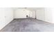 Large bonus room featuring grey carpeting and multiple doors at 2933 Andrews Nw Dr, Atlanta, GA 30305