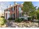 Brick home with landscaped yard and brick walkway at 2933 Andrews Nw Dr, Atlanta, GA 30305