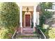 Inviting front entrance with brick steps and hardwood door at 2933 Andrews Nw Dr, Atlanta, GA 30305