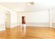 Spacious living room with hardwood floors and views into other rooms at 2933 Andrews Nw Dr, Atlanta, GA 30305