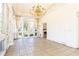 Sunroom with tiled floor and chandelier at 2933 Andrews Nw Dr, Atlanta, GA 30305