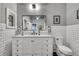 Stylish bathroom features a marble countertop, black fixtures, and white subway tile at 878 Peachtree Ne St # 535, Atlanta, GA 30309