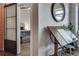 Cozy bedroom featuring a sliding barn door, a rustic wooden trunk, and modern decor at 878 Peachtree Ne St # 535, Atlanta, GA 30309