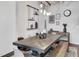 Elegant dining room showcasing a large wooden table, bench seating, and decorative shelving at 878 Peachtree Ne St # 535, Atlanta, GA 30309