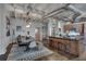 Modern kitchen with island, stainless steel appliances, and exposed ductwork at 878 Peachtree Ne St # 535, Atlanta, GA 30309