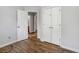 Bright bedroom with hardwood floors and double door closet at 4037 Monarch Dr, Mcdonough, GA 30253