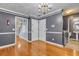 Dining room featuring an elegant chandelier and hardwood floors at 4127 Conley Pond Ct, Decatur, GA 30034
