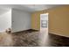 Spacious living room with wood-look flooring and neutral wall tones at 4127 Conley Pond Ct, Decatur, GA 30034