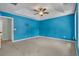 Spacious main bedroom with plush carpet and trey ceilings at 4127 Conley Pond Ct, Decatur, GA 30034