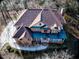 Aerial view of a two-story brick house at 1411 River Station Dr, Lawrenceville, GA 30045