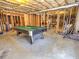 Partially finished basement featuring a pool table at 1411 River Station Dr, Lawrenceville, GA 30045