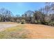 Large backyard with open space and mature trees at 9105 Griffin Sw Ln, Covington, GA 30014