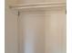 Simple closet with a hanging rod and shelf at 9105 Griffin Sw Ln, Covington, GA 30014