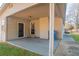 Covered patio with exterior door and storage area at 9105 Griffin Sw Ln, Covington, GA 30014