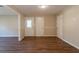 Bright entryway with wood flooring and access to other rooms at 9105 Griffin Sw Ln, Covington, GA 30014