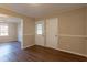 Bright entryway with wood flooring and access to other rooms at 9105 Griffin Sw Ln, Covington, GA 30014