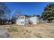 House exterior showcasing a ranch-style home with a screened porch at 9105 Griffin Sw Ln, Covington, GA 30014