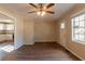 Bright living room with hardwood floors and a view of the kitchen at 9105 Griffin Sw Ln, Covington, GA 30014