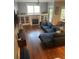 Spacious living room with a fireplace, built-in shelving, and comfortable seating area at 655 Mead St # 28, Atlanta, GA 30312