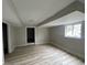 Spacious basement with wood laminate flooring, window, and neutral paint at 5145 Dublin Sw Dr, Atlanta, GA 30331