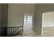 Hallway features wood floors and lots of light from the large outdoor deck at 5145 Dublin Sw Dr, Atlanta, GA 30331