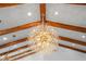 Large, modern crystal chandelier in a renovated home at 2690 Williamsburg Dr, Decatur, GA 30034