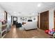 Finished basement with wood flooring, a sitting area, and space for play at 4286 Pool Rd, Winston, GA 30187