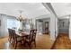 Dining room featuring hardwood floors and a chandelier at 4286 Pool Rd, Winston, GA 30187